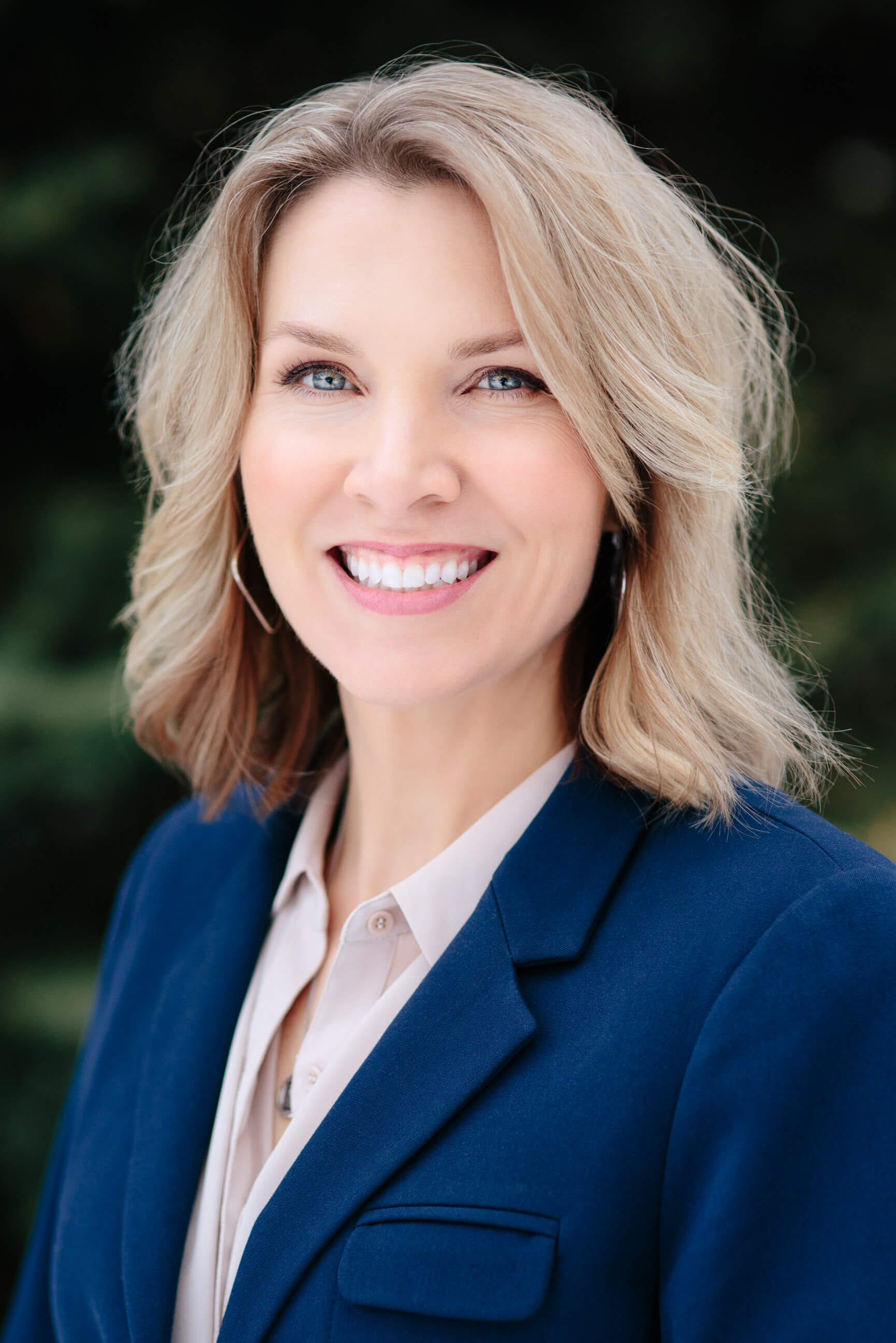 A woman smiles for her Missoula Montana headshots